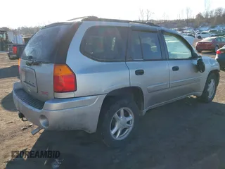 2005 GMC Envoy SLE with VIN 1GKDT13S452194933, listed as a IAAI auction lot 41426512 with 176,897 mi miles. Bid and sale history available at carsss.com. Image 4.