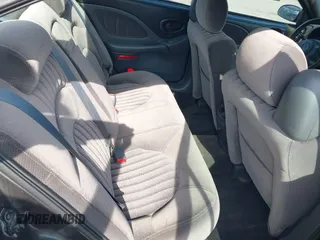 2003 Pontiac Bonneville SE z VIN 1G2HX52K934181238, wystawiony jako IAAI lot #41483636 z przebiegiem 176 737 mil mil oraz . Historia ofert i sprzedaży dostępna na DreamBid. Obrazek 8.