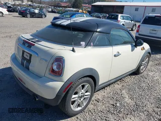 2012 MINI Coupe z VIN WMWSX1C50CT163832, wystawiony jako IAAI lot #41837456 z przebiegiem 123 906 mil mil oraz . Historia ofert i sprzedaży dostępna na DreamBid. Obrazek 4.
