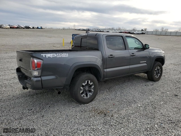 2021 Toyota Tacoma 4WD SR with VIN 3TMCZ5AN3MM422826, listed as a Copart auction lot 50305865 with 74,876 mi miles and Salvage Title. Bid and sale history available at carsss.com. Image 3.