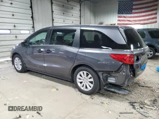 2019 Honda Odyssey LX with VIN 5FNRL6H24KB101473, listed as a Copart auction lot 51894325 with 66,285 mi miles and Salvage Title. Bid and sale history available at DreamBid. Image 2.
