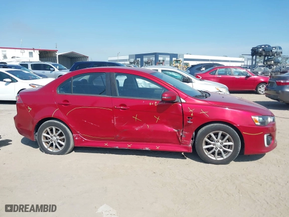 2016 Mitsubishi Lancer ES with VIN JA32U2FU6GU011198, listed as a IAAI auction lot 41932443 with 122,991 mi miles. Bid and sale history available at carsss.com. Image 13.