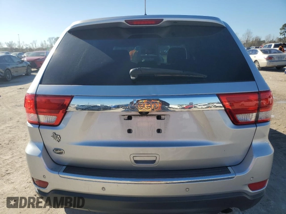 2013 Jeep Grand Cherokee Overland with VIN 1C4RJECG4DC644809, listed as a Copart auction lot 42265005 with 213,493 mi miles and Salvage Title. Bid and sale history available at carsss.com. Image 6.
