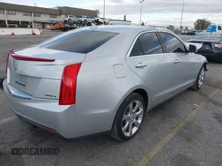 2013 Cadillac ATS Luxury with VIN 1G6AB5RX4D0154991, listed as a IAAI auction lot 41688976 with 136,238 mi miles and . Bid and sale history available at DreamBid. Image 4.