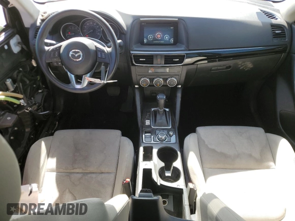2016 Mazda CX-5 Sport with VIN JM3KE4BY4G0734582, listed as a Copart auction lot 55908515 with 52,323 mi miles and Salvage title. Bid and sale history available at DreamBid. Image 8.