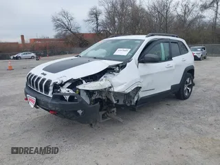 2015 Jeep Cherokee Trailhawk with VIN 1C4PJMBB7FW741365, listed as a IAAI auction lot 41879685 with 94,135 mi miles and . Bid and sale history available at carsss.com. Image 18.