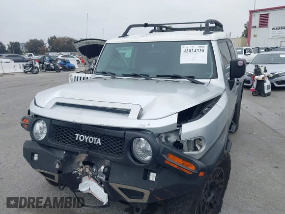 2007 Toyota FJ Cruiser with VIN JTEBU11F370036941, listed as a IAAI auction lot 42024330 with 164,703 mi miles. Bid and sale history available at carsss.com. Image 17.