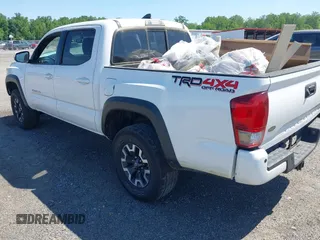 2016 Toyota Tacoma SR with VIN 3TMCZ5AN0GM003224, listed as a IAAI auction lot 42289910 with 140,899 mi miles and . Bid and sale history available at DreamBid. Image 3.