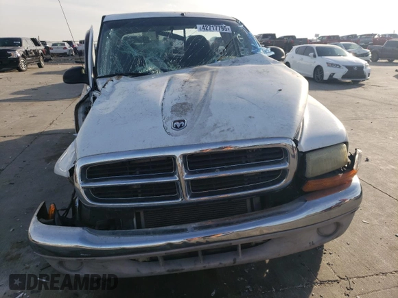2001 Dodge Dakota z VIN 1B7FL26X31S152202, wystawiony jako Copart lot #42717795 z przebiegiem Nie podano mil oraz Szkoda całkowita • Salvage title. Historia ofert i sprzedaży dostępna na DreamBid. Obrazek 5.