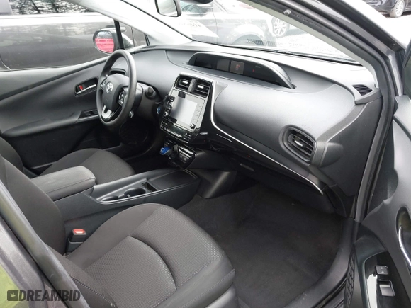 2021 Toyota Prius L Eco with VIN JTDKAMFU2M3143138, listed as a IAAI auction lot 41658263 with 102,718 mi miles. Bid and sale history available at carsss.com. Image 5.