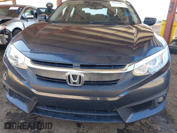2018 Honda Civic EX-L z VIN JHMFC1F8XJX033602, wystawiony jako IAAI lot #42161015 z przebiegiem 99 597 mil mil oraz . Historia ofert i sprzedaży dostępna na DreamBid. Obrazek 12.