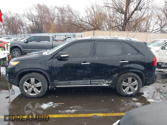2012 Kia Sorento EX with VIN 5XYKUDA2XCG301636, listed as a IAAI auction lot 41619793 with 220,692 mi miles. Bid and sale history available at carsss.com. Image 14.