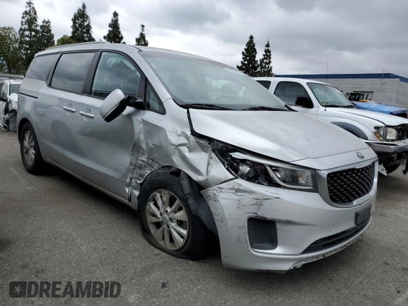 2015 Kia Sedona LX with VIN KNDMB5C17F6070646, listed as a Copart auction lot 56528444 with 231,095 mi miles and Salvage Title. Bid and sale history available at carsss.com. Image 4.