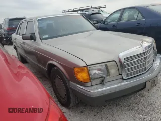 1989 Mercedes-Benz 560 with VIN WDBCA39E1KA479955, listed as a Copart auction lot 76202804 with 132,546 mi miles and Salvage Title. Bid and sale history available at DreamBid. Image 4.