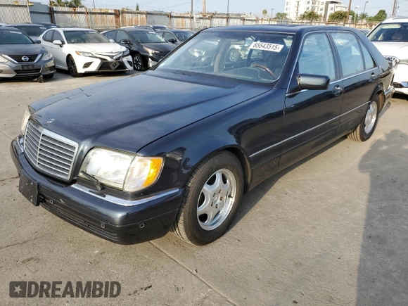 1999 Mercedes-Benz S with VIN WDBGA57G5XA428158, listed as a Copart auction lot 65543515 with 65,698 mi miles and Salvage title. Bid and sale history available at DreamBid. Image 1.