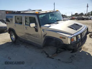 2003 Hummer H2 with VIN 5GRGN23U93H132656, listed as a Copart auction lot 71987404 with 152,287 mi miles and Salvage Title. Bid and sale history available at carsss.com. Image 4.