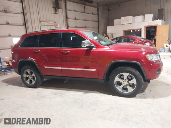 2011 Jeep Grand Cherokee Limited z VIN 1J4RR5GG7BC612091, wystawiony jako IAAI lot #41878511 z przebiegiem 127 114 mil mil oraz . Historia ofert i sprzedaży dostępna na DreamBid. Obrazek 13.