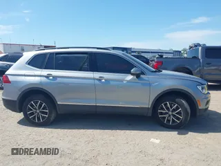 2020 Volkswagen Tiguan SE with VIN 3VV3B7AX8LM077472, listed as a IAAI auction lot 41933521 with 52,028 mi miles and . Bid and sale history available at DreamBid. Image 13.