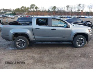 2021 Chevrolet Colorado 4WD Z71 with VIN 1GCGTDEN0M1289754, listed as a IAAI auction lot 41837440 with 30,923 mi miles and . Bid and sale history available at DreamBid. Image 13.