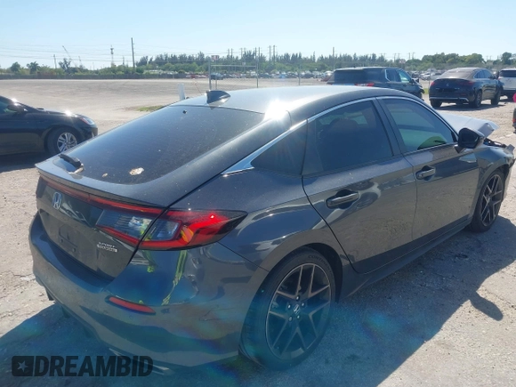 2023 Honda Civic Sport Touring z VIN 19XFL1H80PE017819, wystawiony jako IAAI lot #41833813 z przebiegiem 26 279 mil mil oraz . Historia ofert i sprzedaży dostępna na DreamBid. Obrazek 4.