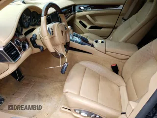 2016 Porsche Panamera 4 z VIN WP0AA2A78GL003052, wystawiony jako Copart lot #46815913 z przebiegiem 55 454 mil mil oraz . Historia ofert i sprzedaży dostępna na DreamBid. Obrazek 7.