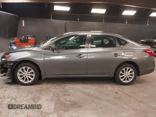 2019 Nissan Sentra S z VIN 3N1AB7AP3KY368736, wystawiony jako IAAI lot #42283123 z przebiegiem 89 117 mil mil oraz . Historia ofert i sprzedaży dostępna na DreamBid. Obrazek 15.