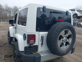 2011 Jeep Wrangler Sahara with VIN 1J4AA5D15BL538240, listed as a IAAI auction lot 41793836 with 172,528 mi miles and . Bid and sale history available at carsss.com. Image 3.