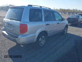 2005 Honda Pilot EX-L with VIN 5FNYF18615B001814, listed as a IAAI auction lot 42063992 with 258,923 mi miles and . Bid and sale history available at carsss.com. Image 4.