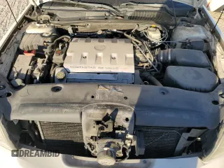 2001 Cadillac DeVille DHS z VIN 1G6KE57Y31U229255, wystawiony jako Copart lot #75101214 z przebiegiem 141 187 mil mil oraz Czysty tytuł • Clean title. Historia ofert i sprzedaży dostępna na DreamBid. Obrazek 11.
