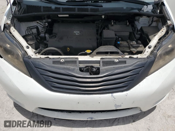 2014 Toyota Sienna L with VIN 5TDZK3DC3ES430634, listed as a Copart auction lot 60715375 with 122,621 mi miles and Salvage title. Bid and sale history available at DreamBid. Image 12.