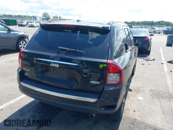 2017 Jeep Compass Latitude with VIN 1C4NJDEB0HD108725, listed as a IAAI auction lot 42820801 with 179,469 mi miles and . Bid and sale history available at DreamBid. Image 4.