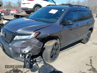 2021 Honda Passport Elite with VIN 5FNYF8H07MB018359, listed as a IAAI auction lot 41834413 with 28,278 mi miles and . Bid and sale history available at DreamBid. Image 2.