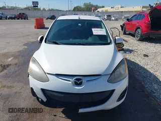 2014 Mazda 2 Sport with VIN JM1DE1KY0E0175562, listed as a IAAI auction lot 42023803 with 247,411 mi miles and . Bid and sale history available at carsss.com. Image 12.