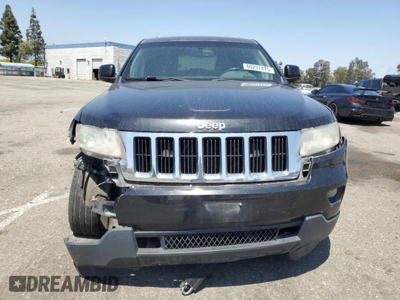 2011 Jeep Grand Cherokee Laredo with VIN 1J4RR4GG0BC563603, listed as a Copart auction lot 60237475 with 243,885 mi miles and Salvage title. Bid and sale history available at DreamBid. Image 5.