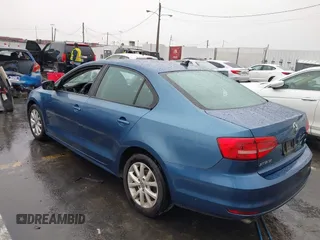 2015 Volkswagen Jetta Sedan 1.8T SE with VIN 3VWD17AJ5FM310694, listed as a IAAI auction lot 41735569 with 147,232 mi miles. Bid and sale history available at carsss.com. Image 3.