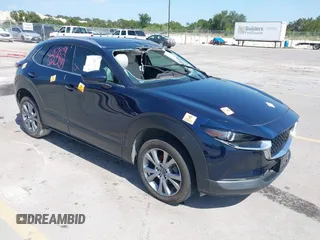 2022 Mazda CX-30 S Premium with VIN 3MVDMBDL8NM450181, listed as a IAAI auction lot 41878044 with 41,553 mi miles and . Bid and sale history available at DreamBid. Image 1.