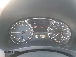 2015 Nissan Altima SV with VIN 1N4AL3AP1FC409128, listed as a Copart auction lot 86765124 with 218,248 mi miles and Salvage Title. Bid and sale history available at DreamBid. Image 9.