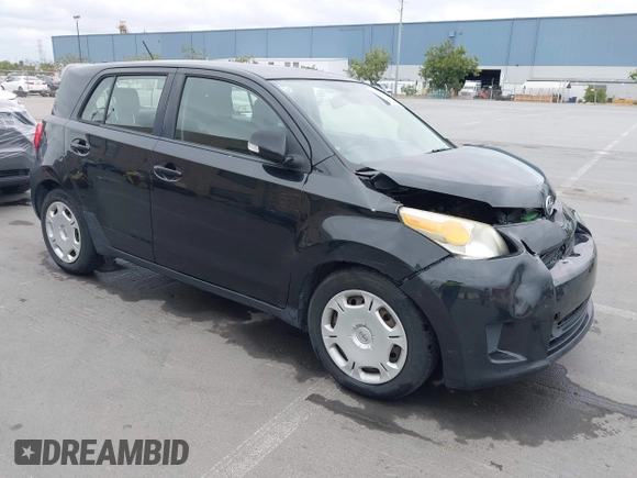 2009 Scion xD with VIN JTKKU10469J034191, listed as a IAAI auction lot 41982622 with 175,743 mi miles. Bid and sale history available at carsss.com. Image 1.
