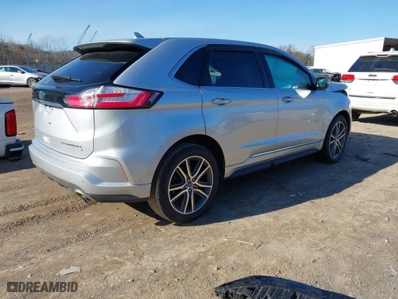 2019 Ford Edge Titanium with VIN 2FMPK3K98KBC68569, listed as a IAAI auction lot 41209347 with 75,519 mi miles. Bid and sale history available at carsss.com. Image 4.