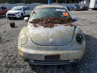 2004 Volkswagen New Beetle Coupe GLS with VIN 3VWCK31C74M423644, listed as a Copart auction lot 73349914 with 239,664 mi miles and Clean Title. Bid and sale history available at carsss.com. Image 5.