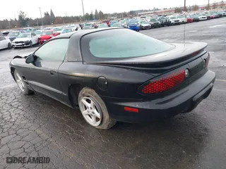 2000 Pontiac Firebird with VIN 2G2FS22K7Y2140141, listed as a IAAI auction lot 41219773 with 1 mi miles. Bid and sale history available at carsss.com. Image 3.