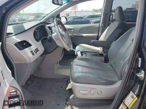 2012 Toyota Sienna XLE AAS с VIN 5TDYK3DC9CS242130, выставлен на аукционе Copart как лот 60423935 с пробегом 175 387 миль миль и Списание • Salvage title. История ставок и продаж доступна на DreamBid. Изображение 7.
