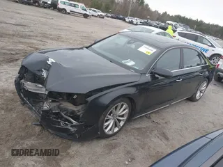 2011 Audi A8 z VIN WAURVAFDXBN026102, wystawiony jako IAAI lot #39096660 z przebiegiem 151 060 mil mil oraz . Historia ofert i sprzedaży dostępna na DreamBid. Obrazek 2.
