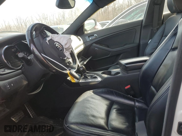 2013 Kia Optima SX with VIN 5XXGR4A63DG144869, listed as a Copart auction lot 86374924 with 187,064 mi miles and Salvage Title. Bid and sale history available at DreamBid. Image 7.
