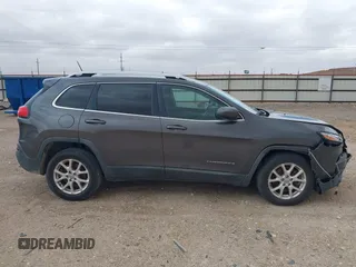 2014 Jeep Cherokee Latitude z VIN 1C4PJLCS1EW319194, wystawiony jako IAAI lot #41710491 z przebiegiem 108 136 mil mil oraz . Historia ofert i sprzedaży dostępna na DreamBid. Obrazek 13.
