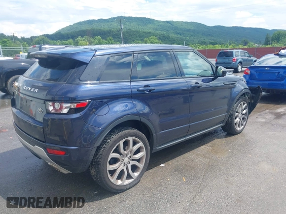 2015 Land Rover Range Rover Evoque Dynamic z VIN SALVT2BG1FH018285, wystawiony jako IAAI lot #42687773 z przebiegiem 92 273 mil mil oraz . Historia ofert i sprzedaży dostępna na DreamBid. Obrazek 4.