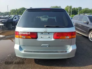 2003 Honda Odyssey EX-L с VIN 2HKRL18033H501741, выставлен на аукционе Copart как лот 60496865 с пробегом Не указан миль и Списание • Salvage title. История ставок и продаж доступна на DreamBid. Изображение 6.