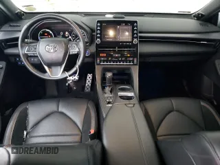 2021 Toyota Avalon Hybrid XSE z VIN 4T1EA1AB7MU005523, wystawiony jako Copart lot #56485694 z przebiegiem 117 297 mil mil oraz Szkoda całkowita • Salvage title. Historia ofert i sprzedaży dostępna na DreamBid. Obrazek 8.