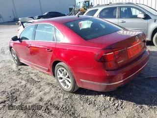 2017 Volkswagen Passat S with VIN 1VWAT7A35HC062529, listed as a IAAI auction lot 41090215 with 127,432 mi miles and . Bid and sale history available at DreamBid. Image 3.