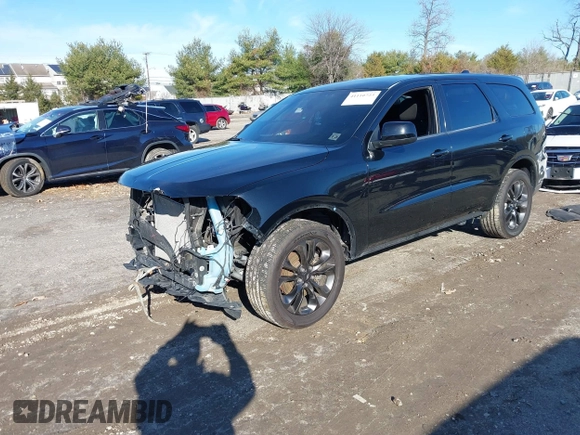 2021 Dodge Durango GT Plus with VIN 1C4RDJDG0MC751032, listed as a IAAI auction lot 41110723 with 90,224 mi miles. Bid and sale history available at carsss.com. Image 2.